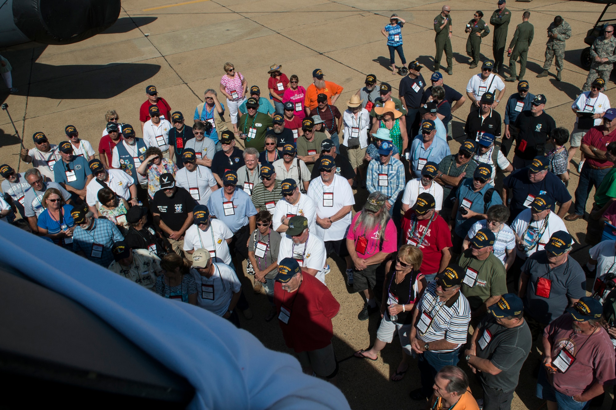 Members of the UTapao Alumni Association attend the unveiling event of a 307th Bomb Wing B-52H Stratofortress nose art on May 1, 2015, Barksdale Air Force Base, La. The Wing is assigned under the Air Force Reserve Command, and the nose art is dedicated in commemoration of the 50th Anniversary of the start of the Vietnam War. (U.S. Air Force photo by Master Sgt. Greg Steele/Released)