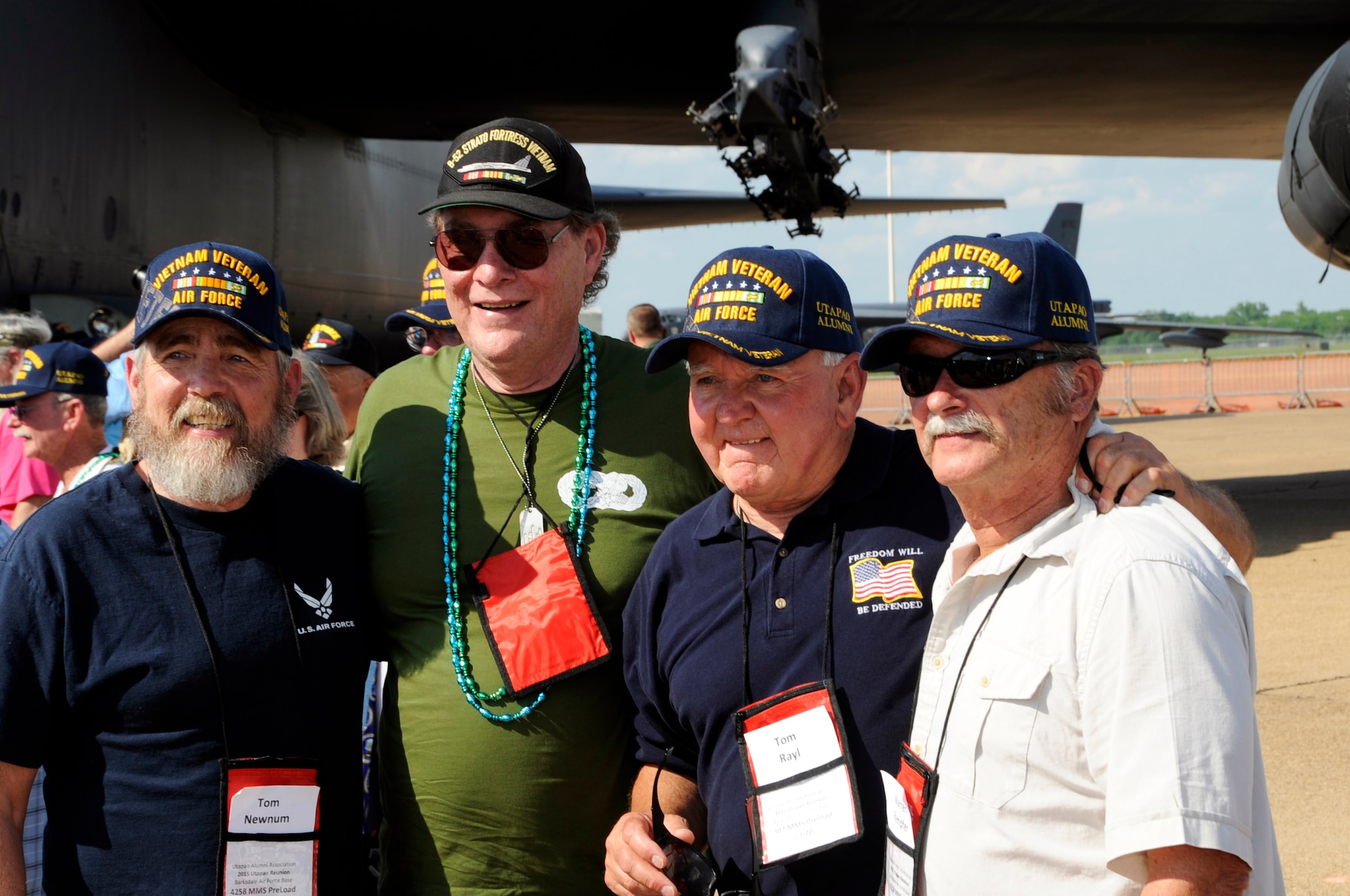 Four friends reunite at the dedication of a B-52, the Lone Star Lady II, in memoriam to the Vietnam Veterans at the Defenders of Liberty Air Show at Barksdale Air Force Base, La. on May 1, 2015.  The veterans were surprised with the unveiling of the new nose art on the B-52. The original Lone Star Lady was a B-52 that flew over Vietnam during Strategic Air Command’s Operation Linebacker II in 1972. (U.S. Air Force photo by Master Sgt. Laura Siebert/Released) 