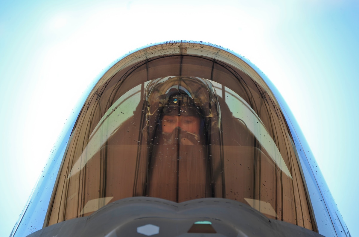 Lt. Col. Christine Mau, 33rd Operations Group deputy commander, prepares to exit her F-35A after completing her first training flight at Eglin Air Force Base, Fla., May 5, 2015. Mau, who previously flew F-15E Strike Eagles, made history as the first female F-35 pilot in the program. (U.S. Air Force photo/Staff Sgt. Marleah Robertson)