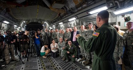 Col. John Lamontagne, 437th Airlift Wing commander, addresses a crowd aboard a C-17 Globemaster III May 5, 2015 at Joint Base Charleston, S.C., during an event celebrating the C-17 surpassing the 3,000,000 millionth flying hour. An aircrew from JB Charleston flew the plane here from Robins Air Force Base, Ga. The first C-17 flight was Sept. 15, 1991 and the Air Force currently has 222 C-17’s in the fleet. (U.S. Air Force photo/Airman 1st Class Clayton Cupit)
