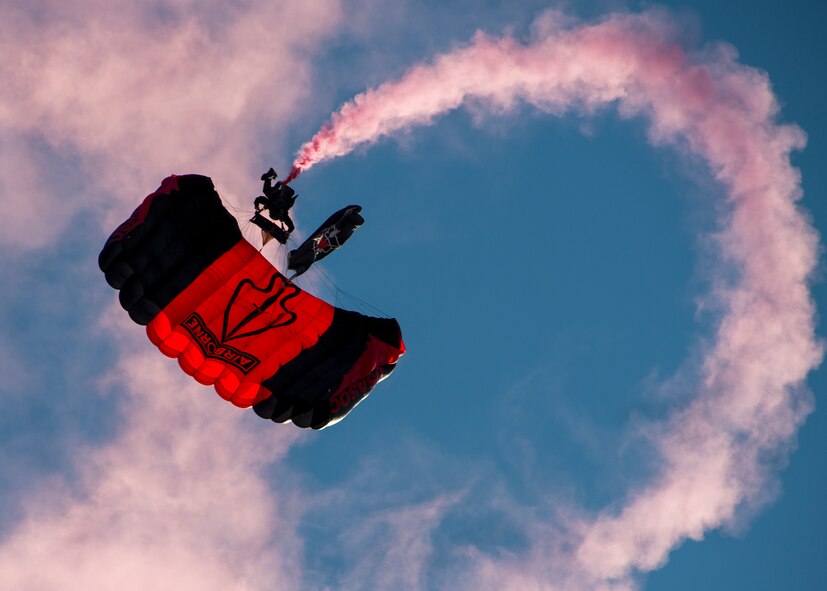 A member of the U. S. Army Special Operations Command’s Black Daggers Parachute Demonstration Team parachutes onto Eglin Air Force Base during the 7th Special Forces Group (Airborne) Red Empire Week Community Day May 5.  A Duke Field C-145 flew to serve as the team’s free-fall jump platform.  (U.S. Air Force photo/Tech. Sgt. Jasmin Taylor)
