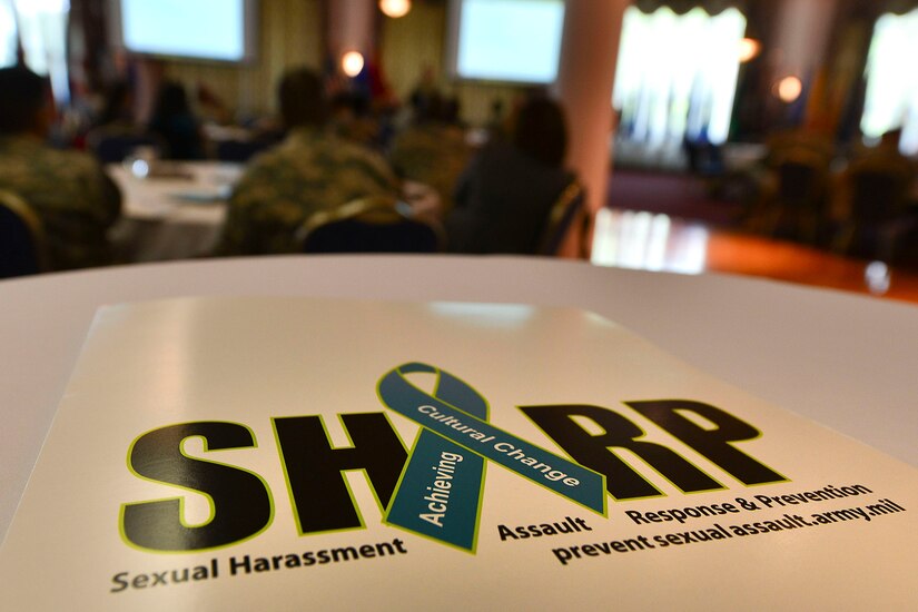 Sexual Harassment/Assault Response and Prevention program summit attendees exchange ideas and practices at Fort Eustis, Va., April 29, 2015. This year, the annual summit teamed installation leadership with local universities’ leadership to tackle combating and preventing sexual harassment and assault. (U.S. Air Force photo by Staff Sgt. Natasha Stannard/Released) 