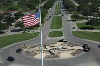 Members of the 502nd Civil Engineer Squadron from Joint Base San Antonio-Fort Sam Houston work on the JBSA-Randolph Washington Circle star April 29. The star on the traffic island in Washington Circle, one of the earliest features of the Army Air Corps’ Randolph Field more than eight decades ago, will soon become a distinctive hardscape filled with terracotta paver bricks and bordered by multi-colored river stones and decomposed granite while retaining its five-pointed appearance. (U.S. Air Force photo by Joel Martinez/Released)