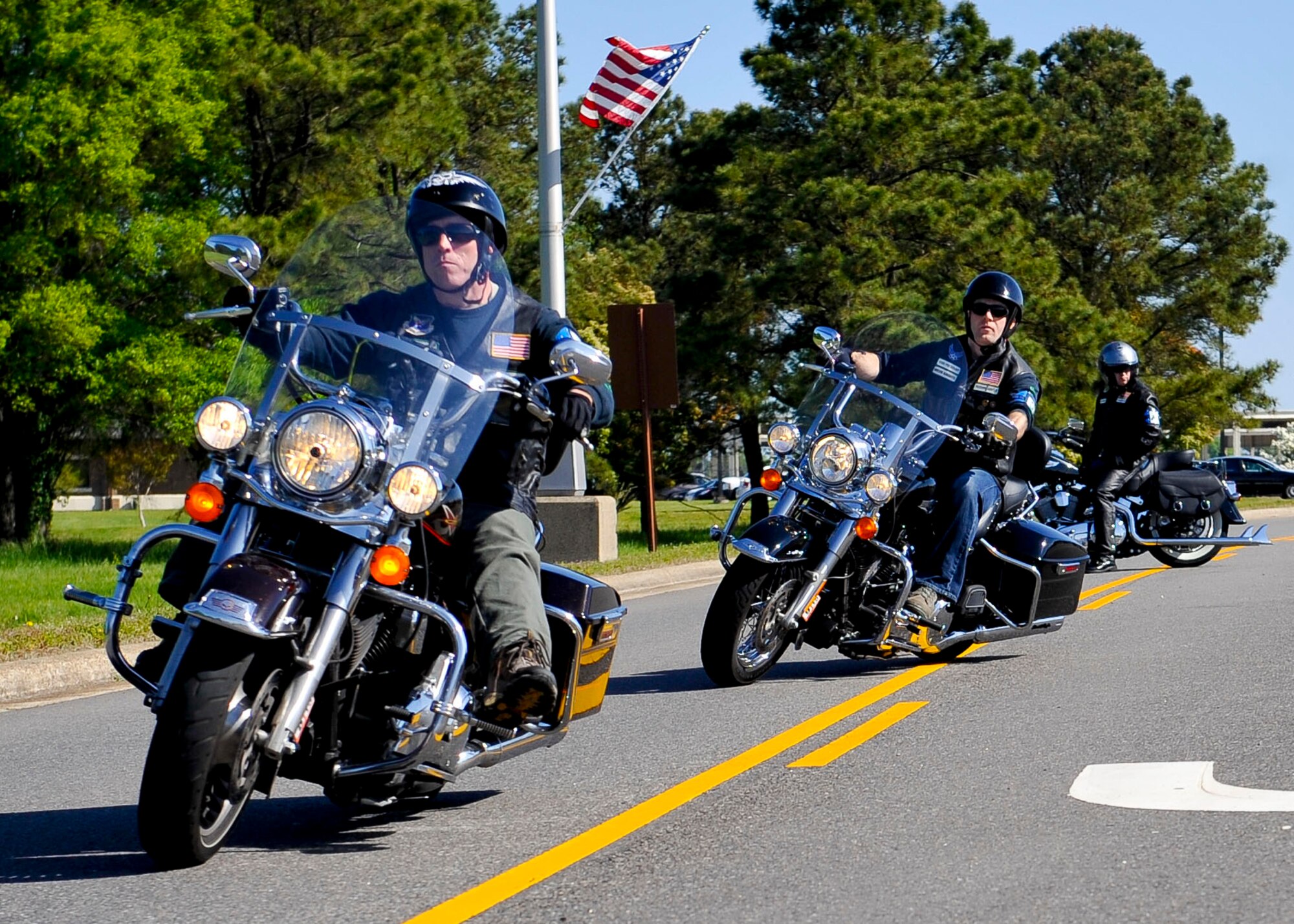Motorcyclists depart for a 35-mile ride to Surry, Va., during the 4th Annual Standing Together Against Rape Road Rally at Langley Air Force Base, Va., April 29, 2015. The rally signified the end of Sexual Assault Awareness Month. (U.S. Air Force photo by Senior Airman Breonna Veal/Released)