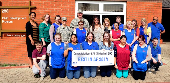 Members of the 100th Force Support Squadron Child Development Program gather for a group photo with U.S. Air Force Col. Kenneth T. Bibb, Jr., 100th Air Refueling Wing commander and Chief Master Sgt. Kathryn Aleshire, 100 ARW acting command chief, April 13, 2015, at the Child Development Center on RAF Mildenhall, England. The CDC team was recently chosen as the Air Force’s best Child Development Program of the Year 2014. (U.S. Air Force photo by Staff Sgt. Krystie Martinez/Released)
