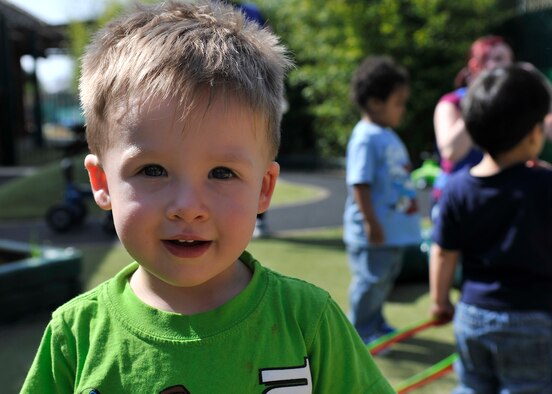 Bryson, 2, son of U.S. Air Force Staff Sgt. Allisha Wennersten, 352nd Special Operations Support Squadron NCO in charge of Intelligence Operations from Poughkeepsie, N.Y., enjoys a sunny day on the playground April 15, 2015, at the Child Development Center on RAF Mildenhall, England. The CDC staff work as a dedicated team to provide a caring and educational environment for children. (U.S. Air Force photo by Airman 1st Class Kyla Gifford/Released)