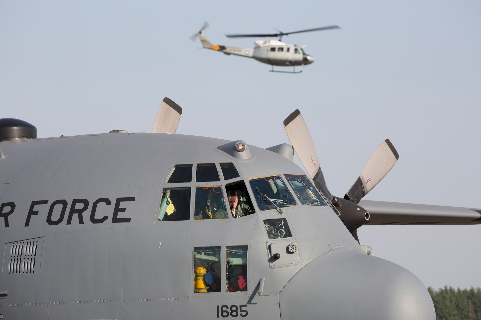 1st Lt. Sydney Croxton, 36th Airlift Squadron C-130 Hercules pilot, performs preflight checks at Yokota Air Base, Japan, May 5, 2015. Airmen departed to conduct humanitarian assistance and disaster relief operations in support of the Government of Nepal in the wake of a 7.8 magnitude earthquake that devastated many regions of the country on April 25, 2015. (U.S. Air Force photo by Osakabe Yasuo/Released) 