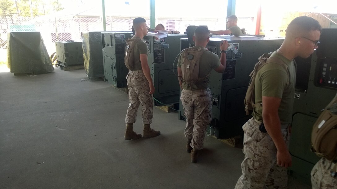 Marines from BWST 6-15 learn to operate AMMPS generator sets through practical application.