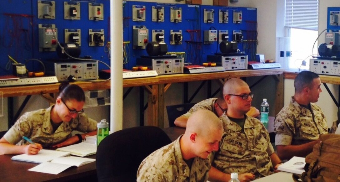 Marines from BEEEST 5-15 learn about motors.