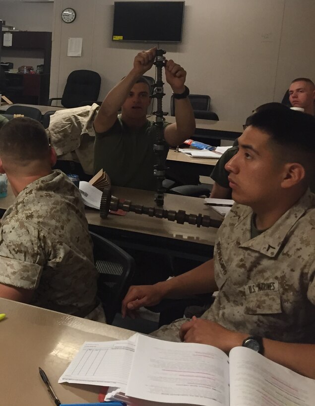 Marines from BEEEST 7-15 learn about electrical and mechanical troubleshooting.