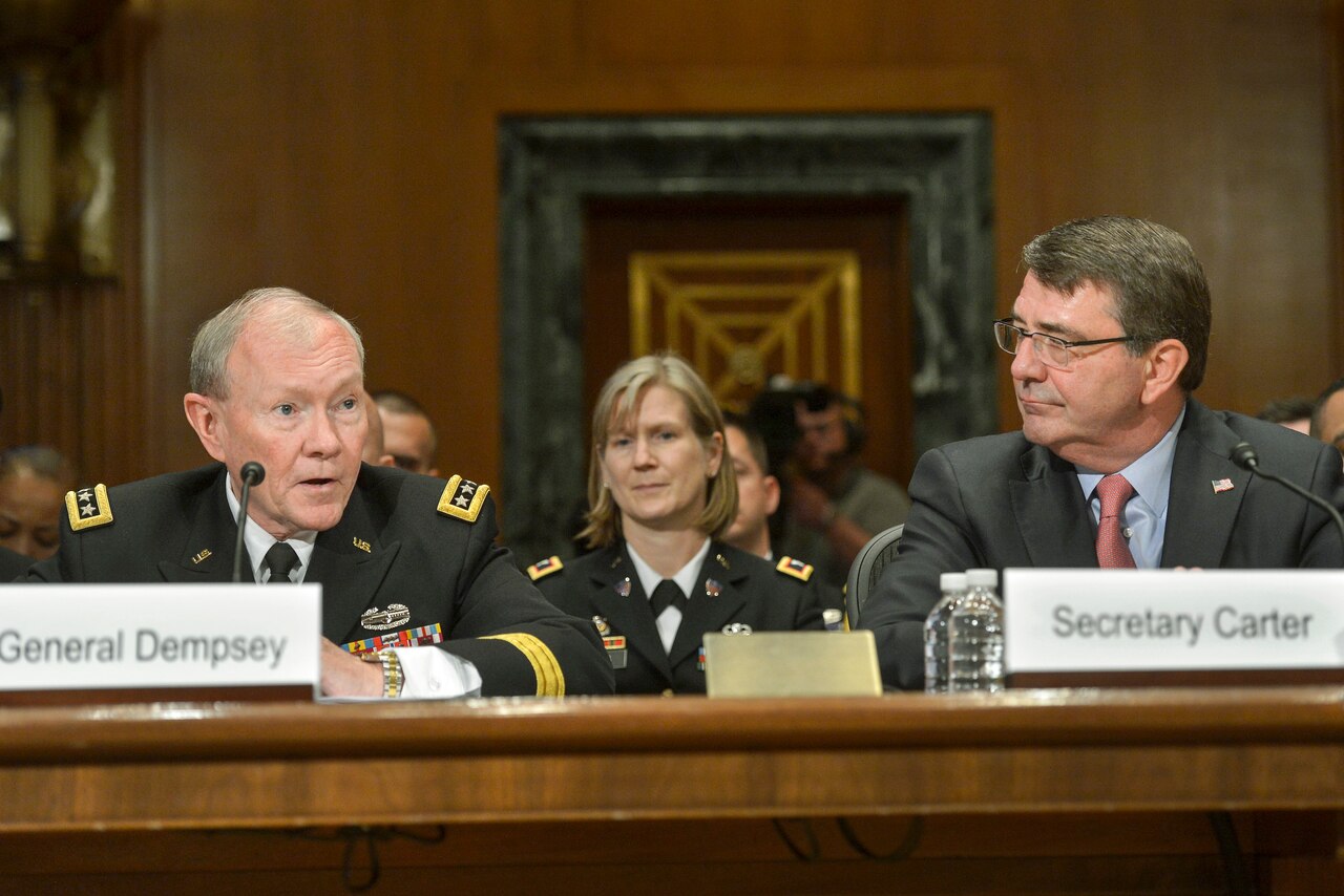 Defense Secretary Ash Carter looks on as Army Gen. Martin E. Dempsey, chairman of the Joint Chiefs of Staff, answers questions as the two defense leaders testify before the Senate Appropriations Committee's defense subcommittee in Washington, May 6, 2015. DoD photo by Glenn Fawcett