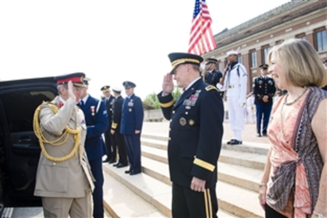 U.S. Army Gen. Martin E. Dempsey, right, chairman of the Joint Chiefs of Staff, welcomes British Gen. Sir Nicholas Houghton, chief of defense staff, to the National Defense University on Fort Lesley J. McNair, Washington, D.C., May 5, 2015. The coalition partners joined for a combined chiefs of staff meeting to discuss common strategic policy, and current and future military challenges facing the two countries.