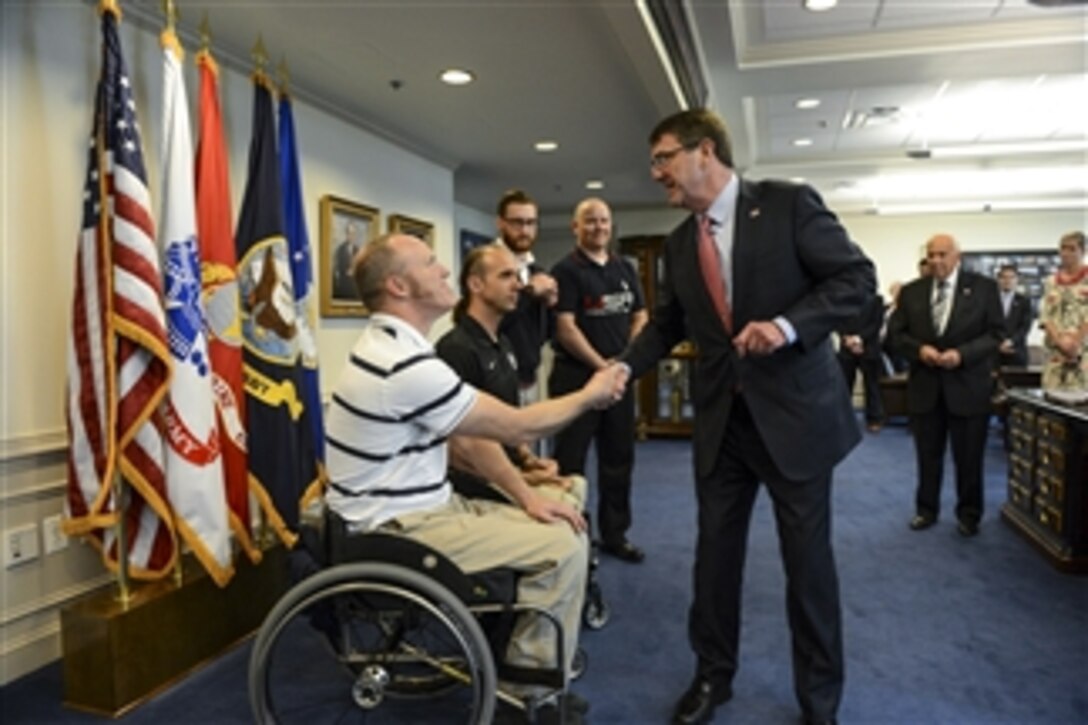 Defense Secretary Ash Carter meets with wounded warrior members of the U.S. Paralympic Team at the Pentagon, May 6, 2015.