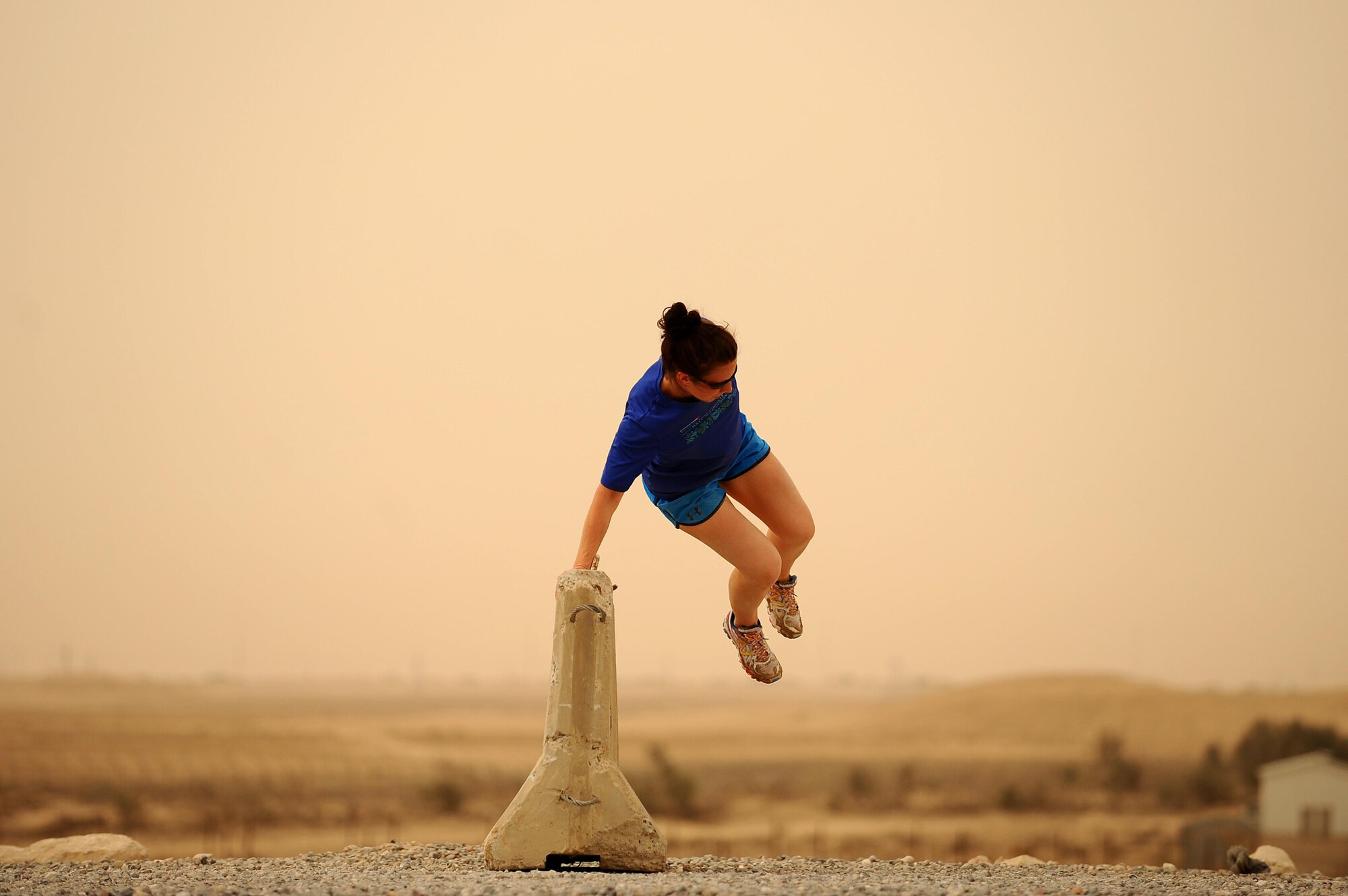 U.S. Airmen with the 386th Air Expeditionary Wing participate in an Explosive Ordnance Disposal Memorial Challenge in Southwest Asia, May 2, 2015. The challenge honors the sacrifice EOD Service members make and to raise awareness for the EOD Warrior Foundation, a non-profit orginization. (U.S. Air Force photo/Tech. Sgt. Brittany E. Jones/Released) 