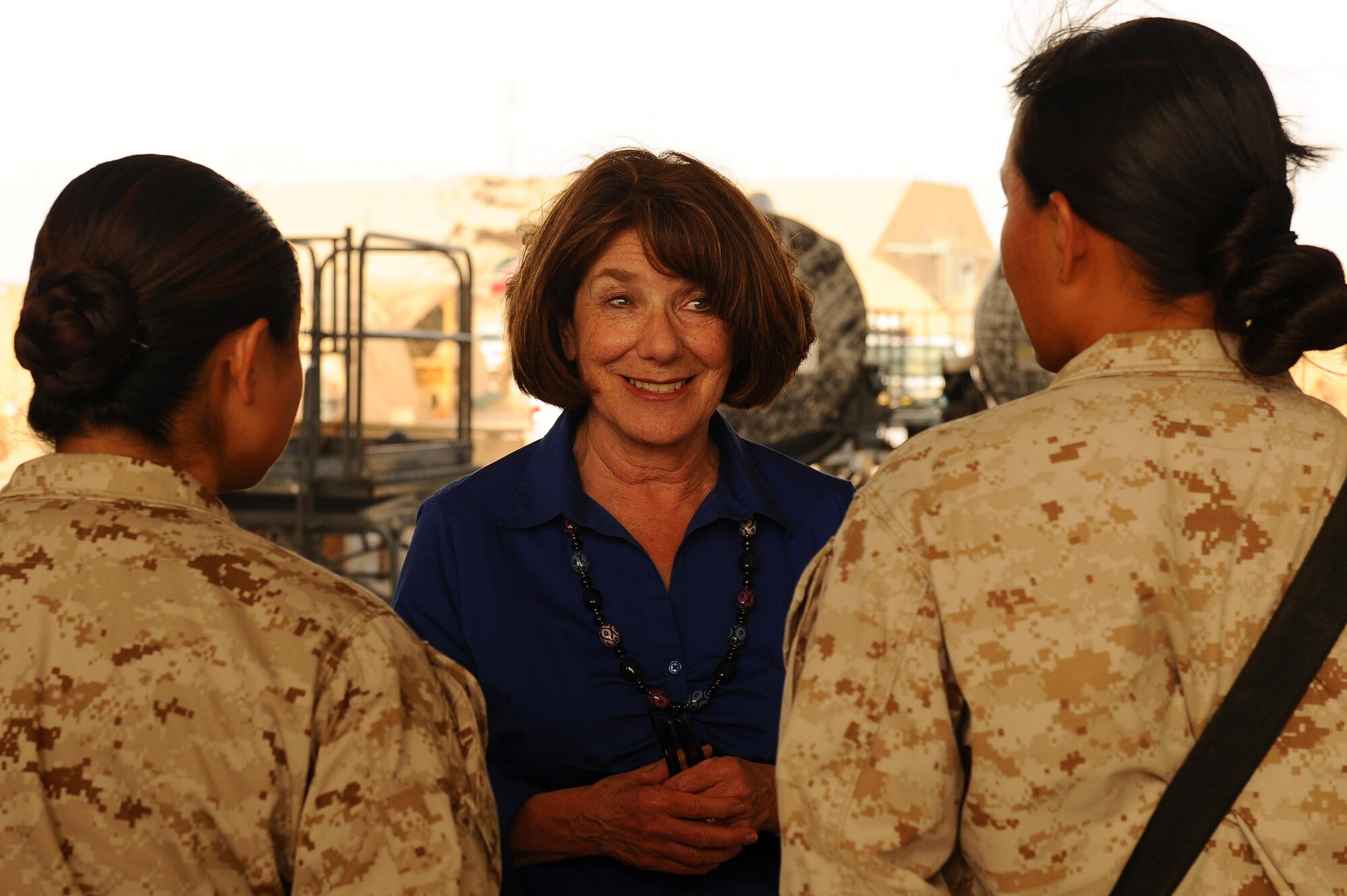 Rep. Susan Davis, House Armed Services Committee, speaks with female U.S. Service members during a visit to Southwest Asia, May, 5, 2015. Davis handed out Mother’s Day cards created by elementary school students in California to honor all the women spending the holiday away from their children. (U.S. Air Force photo/Tech. Sgt. Brittany E. Jones/Released)