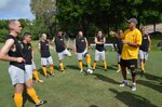 Head Coach and Florida Guardsman Capt. Roye Locklear, right, instructs members of the All Army Men’s Soccer team during training in Jacksonville, Fla., May 5, 2015. 