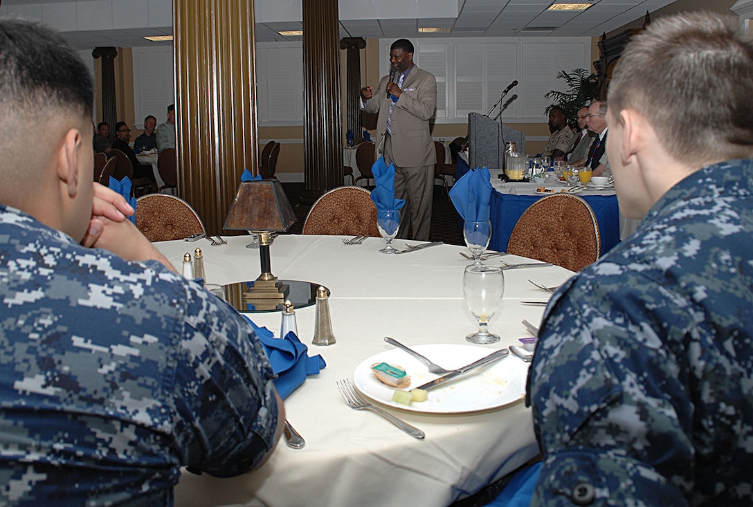 Kurt Bland, deputy director, Communications and Information Systems Division, Marine Corps Logistics Base Albany, speaks to nearly 40 Marines, Sailors and civilian-Marines during the annual National Day of Prayer Breakfast at the Town and Country Restaurant’s Grand Ballroom, May 7.