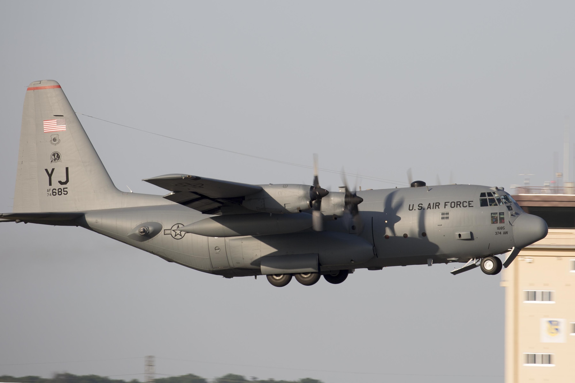 A C-130 Hercules from the 36th Airlift Squadron takes off at Yokota Air Base, Japan, May 5, 2015. Airmen left Yokota to support the U.S. Agency of International Development and the government of Nepal. (U.S. Air Force photo/Osakabe Yasuo) 