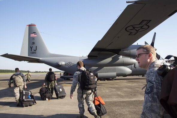 Yokota Airmen board a C-130 Hercules at Yokota Air Base, Japan, May 5, 2015. Airmen departed to conduct humanitarian assistance and disaster relief operations in support of the government of Nepal in the wake of a 7.8 magnitude earthquake that devastated many regions of the country on April 25, 2015. (U.S. Air Force photo/Osakabe Yasuo) 