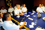 CHANGI NAVAL BASE, Singapore (May 6, 2015) - U.S. Navy Vice Adm. Robert L. Thomas Jr., left center, commander of U.S. 7th Fleet, hosts a multilateral roundtable discussion with Singaporean Col. Chuen Hong Lew, right center, commander of the Republic of Singapore Fleet; Indonesian navy Rear Adm. Darwanto S.H., left, Tentara Nasional Indonesia Eastern Fleet; and Malaysian navy Rear Adm. Dato' Pahlawan Mior Rosdi, right, chief of staff for operations and exercises, Royal Malaysian Navy; aboard the U.S. 7th Fleet flagship USS Blue Ridge (LCC 19). The discussion served as a platform for regional senior naval officers to conduct a professional exchange of ideas aimed to increase theater security cooperation by facilitating bilateral and multilateral military interactions. 