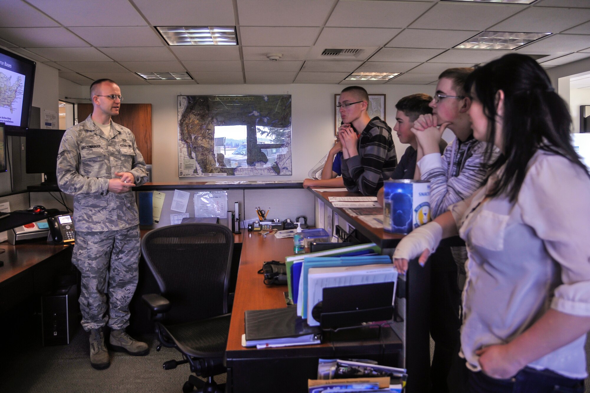 Senior Airman Howard Spitzenberger, 92nd Operations Support Squadron weather forecaster, shows students from Medical Lake High School Junior ROTC the weather tracking system used by the Air Force May 4, 2015, at Fairchild Air Force Base, Wash. Community engagement activities like these showcase Air Force capabilities to the public increasing trust, support and in the case of these Air Force JROTC cadets, interest in joining the Air Force. (U.S. Air Force photo/Airman 1st Class Taylor Bourgeous)