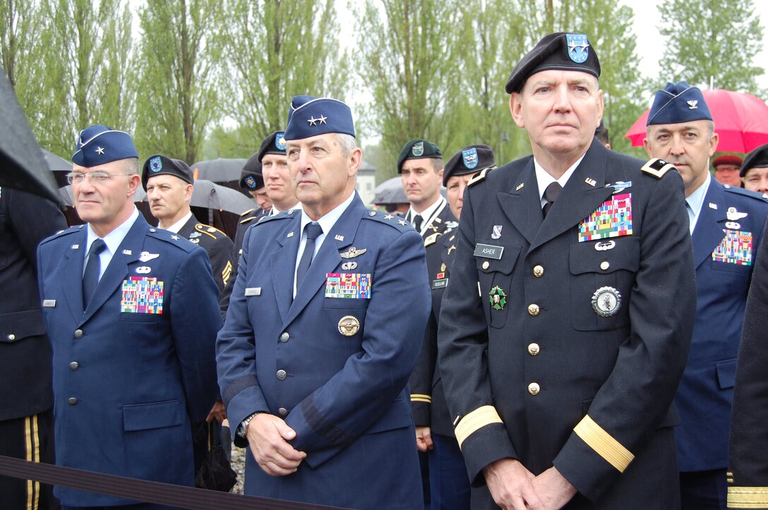 Brig. Gen. Jerome Limoge, the Assistant Adjutant General of Colorado for Air, Maj. Gen. H. Michael Edwards, the Adjutant General of Colorado, and Maj. Gen. Robbie Asher, the Adjutant General of Oklahoma, stand with fellow members of the Colorado and Oklahoma National Guards during the Russian-Orthodox mass that proceeded the commemorative ceremony for the 70th anniversary of the liberation of Dachau Concentration Camp. Members of the Colorado and Oklahoma National Guard participated in various ceremonies May 1-3, 2015, commemorating the 70th anniversary of the liberation of the concentration camp, Dachau. The 157th Infantry Regiment, one of the units that liberated the camp on April 29, 1945, initially mustered from the state of Colorado. The regiment was a subordinate unit to the 45th Infantry Division, initially formed in Oklahoma. (Air National Guard photo by Capt. Kinder Blacke)