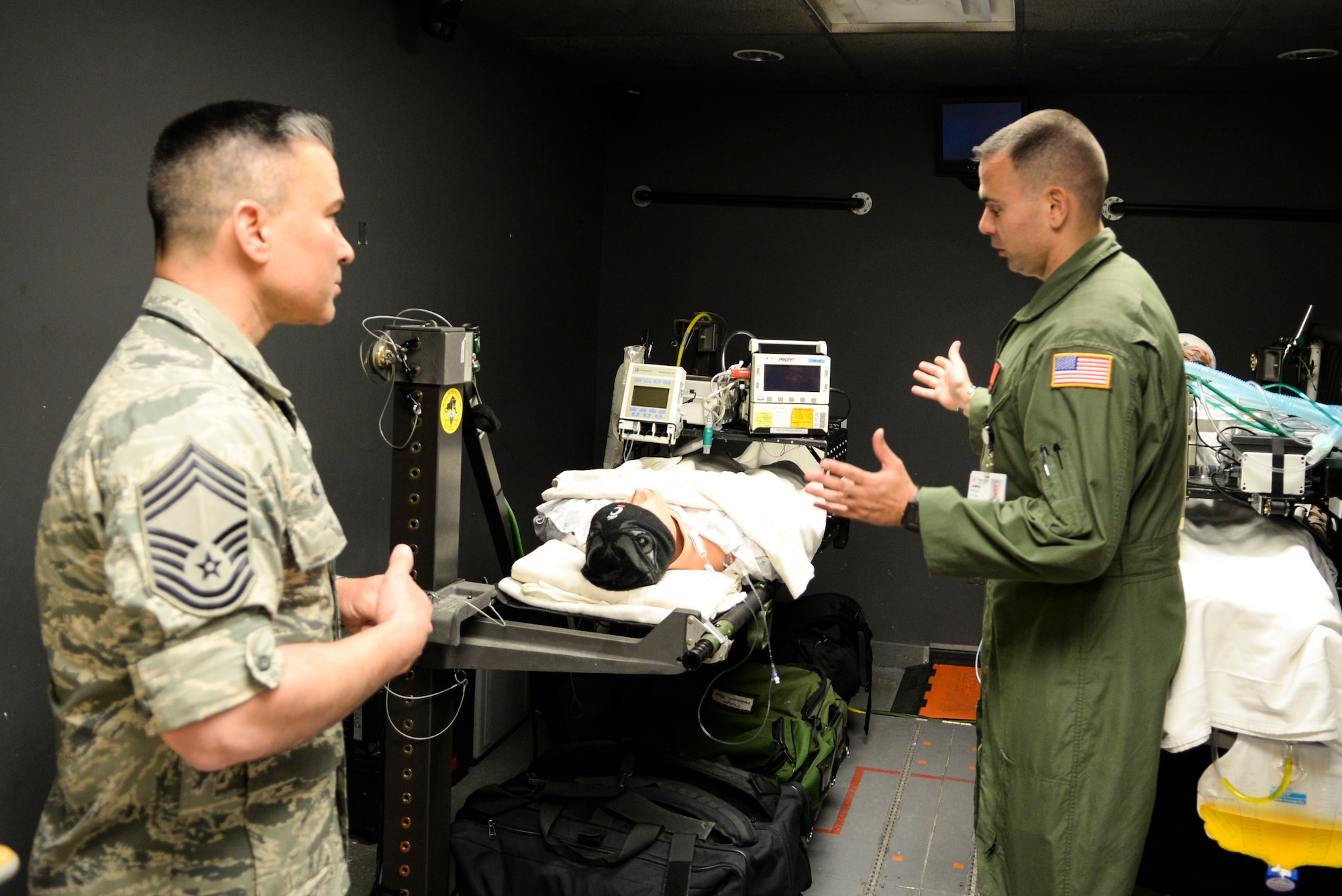 Chief Master Sergeant Jason Pace, Chief, Medical Enlisted Force, is briefed by Senior Master Sergeant James Woods, Center for Sustainment of Trauma and Readiness Skills Cincinnati branch chief, on their capabilities at the University of Cincinnati Health in Cincinnati, Ohio, April 30 during his visit to the facility. The CSTARS program was created to enable Air Force health care providers to refresh their skills by working side-by-side with civilian colleagues treating trauma and critical care patients. (U.S. Air Force photo by Wesley Farnsworth/Released)