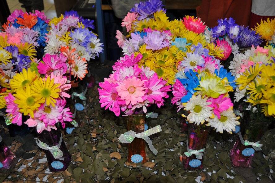 In honor of Mother’s Day, 301st Aircraft Maintenance Squadron Airmen recognized their moms and wives May 2 at Naval Air Station Fort Worth Joint Reserve Base, Texas. Airmen and their families were provided lunch then family members honored their moms with flowers and certificates. The 301st Aircraft Maintenance Squadron Key Spouses organized the entire event. (U.S. Air Force photo/Staff Sgt. Melissa Harvey)