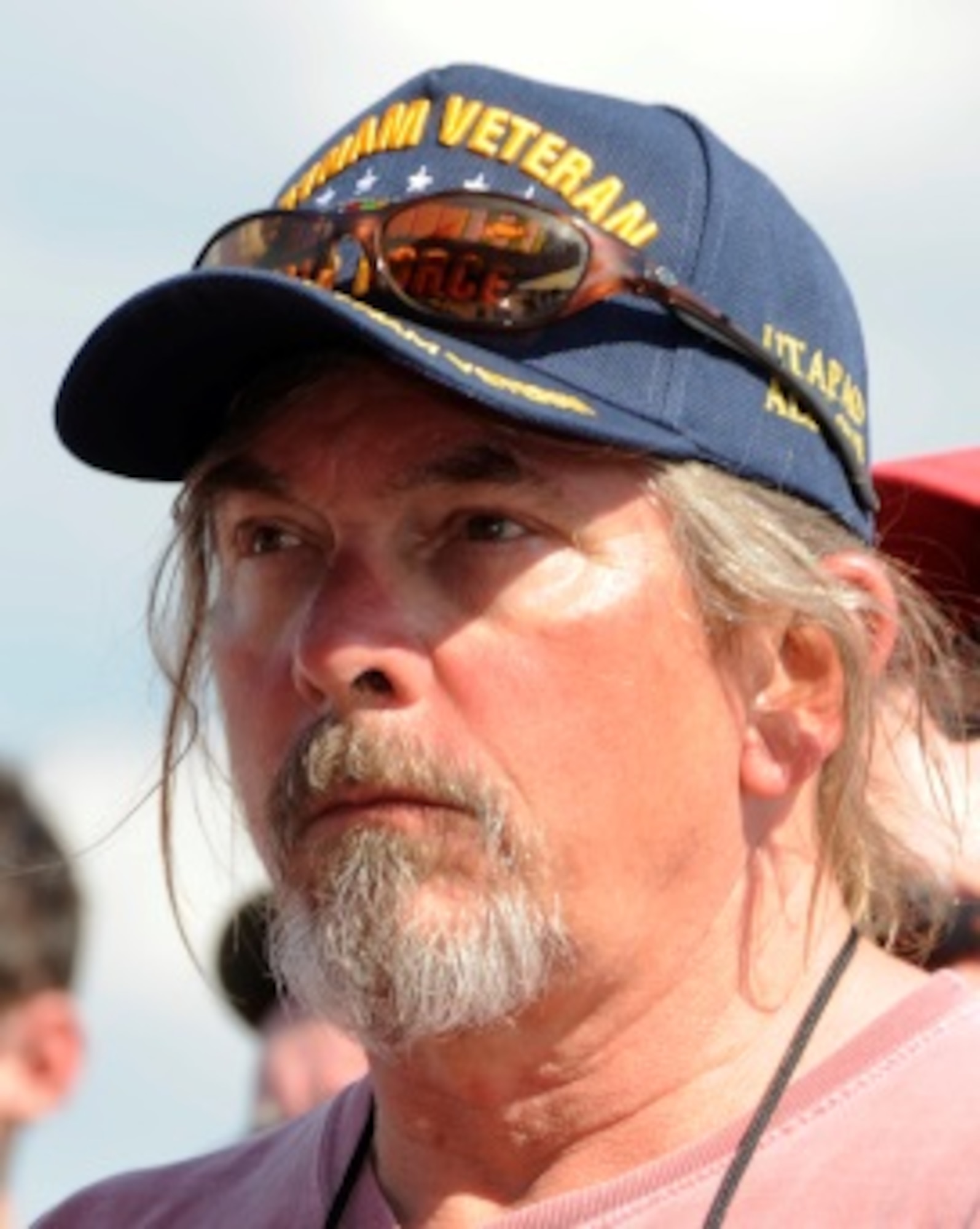 A Vietnam veteran looks on as the nose art for the Lone Star Lady II is explained before being unveiled during a 307th Bomb Wing B-52 static display at Barksdale Air Force Base on May 1, 2015. The 307th Vietnam Veterans had a reunion during the 2015 Defenders of Liberty Air Show and were surprised with a B-52 Stratafortress being dedicated to the men and women who fought in Vietnam. (U.S. Air Force photo by Master Sgt. Laura Siebert /Released)
