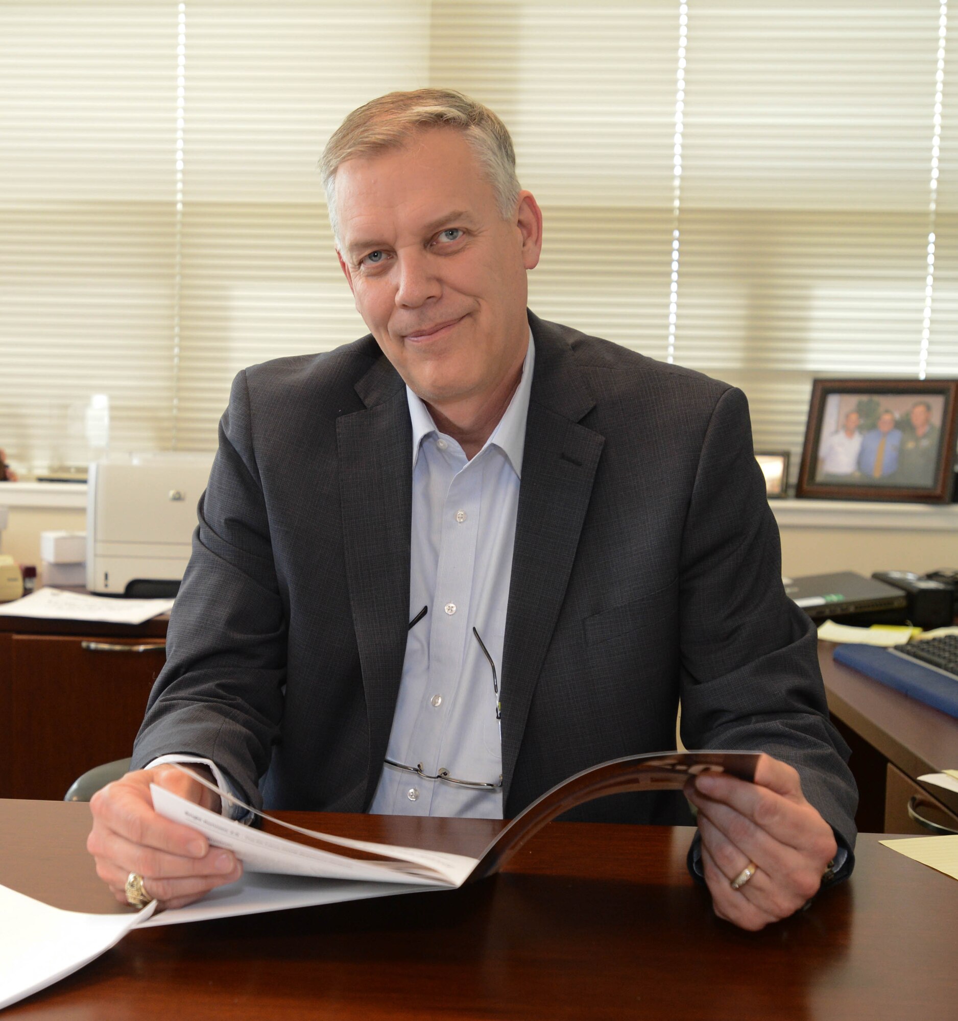Dennis Miller, Hanscom Air Force Base's newest Engineering and Technical Management director, hits the ground running after arriving last month from the Air Force Sustainment Center at Hill AFB, Utah. Miller is responsible for providing for and overseeing the Life Cycle Management Center's technical workforce. (U.S. Air Force photo by Jerry Saslav)