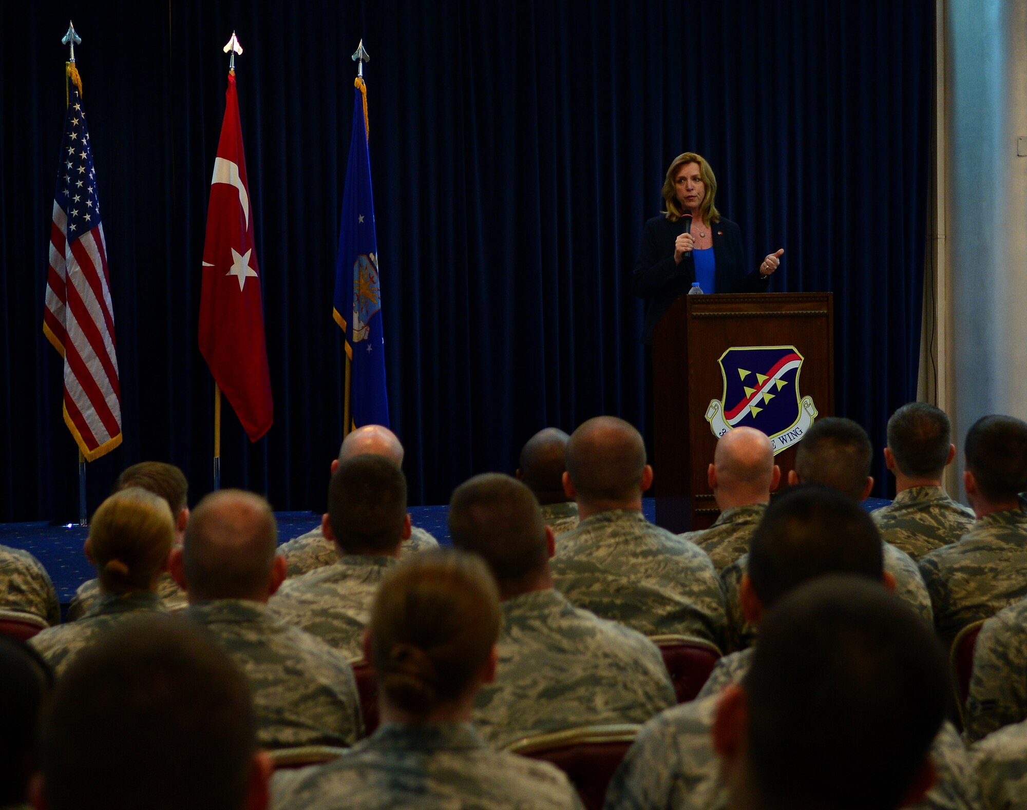 Secretary of the Air Force Deborah Lee James speaks to Airmen during an all-call May 6, 2015, at Incirlik Air Base, Turkey. James addressed challenges and opportunities facing today’s Airmen such as taking care of Airmen, mission balance and mission tempo. (U.S. Air Force photo by Staff Sgt. Caleb Pierce/Released)