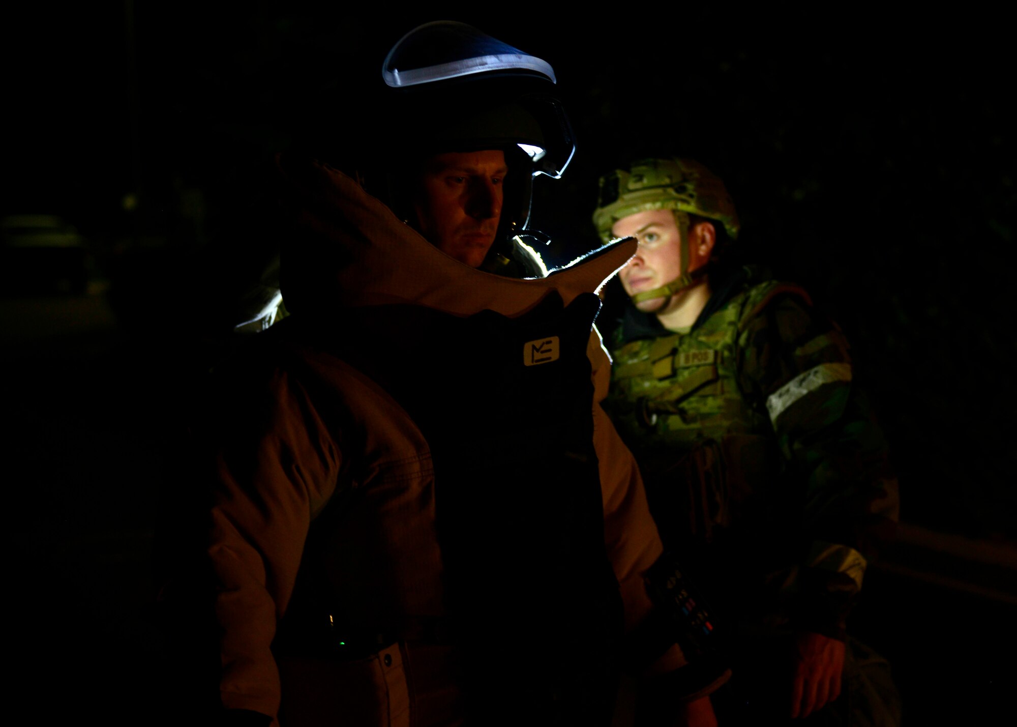 U.S. Air Force Senior Airman Josiah Hamernick, 31st Civil Engineer Squadron explosive ordnance disposal apprentice, ensures Staff Sgt. Michael Ault’s, 31 CES EOD technician, bomb suit is properly donned, during inspection MAROON EXCAVATOR, May 5, 2015, at Aviano Air Base, Italy. The inspection’s scenarios tested the wing’s emergency response and readiness procedures. (U.S. Air Force Senior Airman Areca T. Wilson/Released)