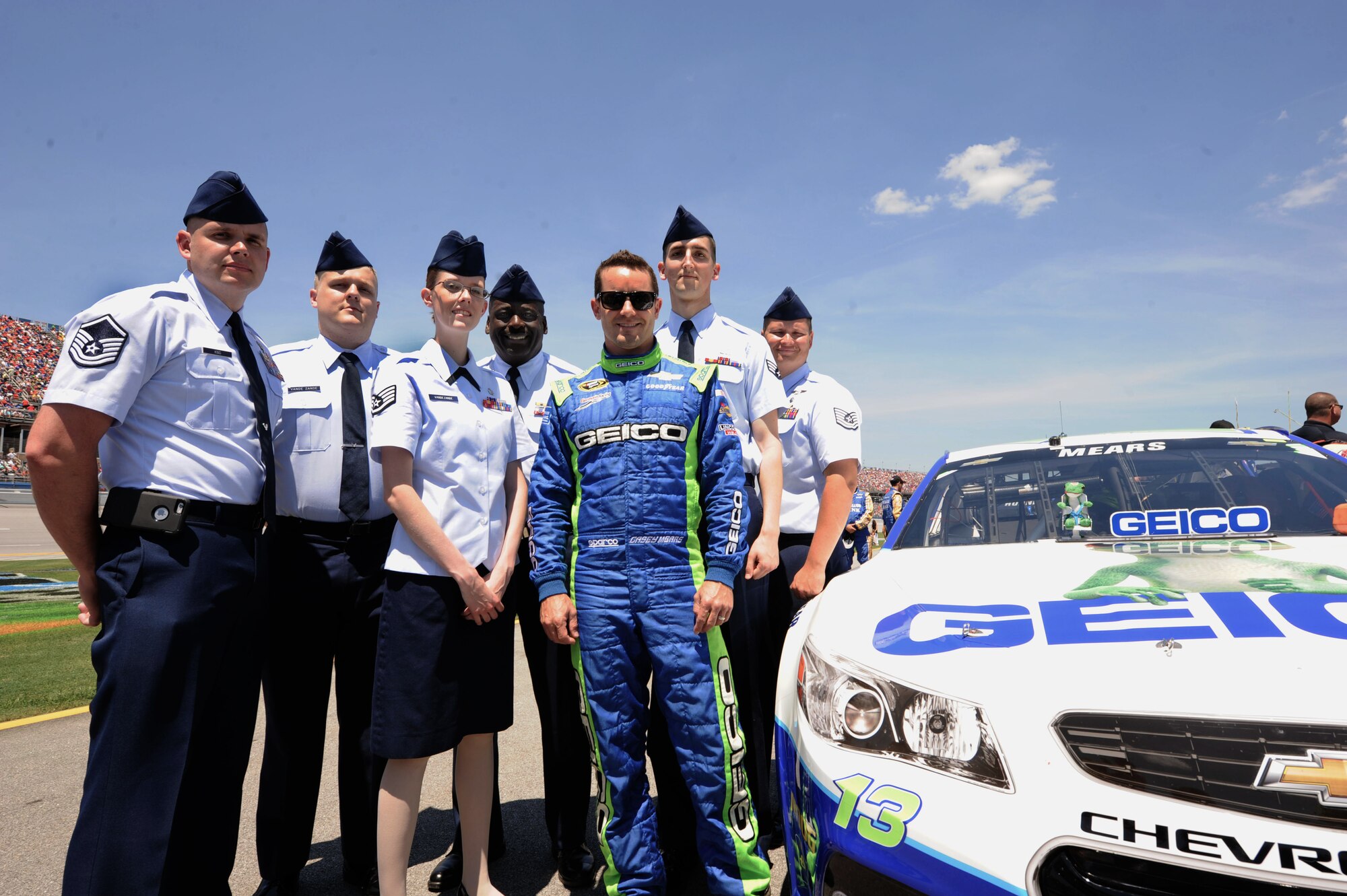 Maxwell Air Force Base recipients of Air Education and Training Command’s 2015 12 Outstanding Airmen of the Year  Award and other base Airmen met with NASCAR driver Casey Mears at the 2015 Geico 500 at the Talladega Superspeedway, May 3, 2015, Talladega, Alabama. The Airmen were given access to pit road and the garage area where they were able to meet drivers and their pit crews. (U.S. Air Force photo by Airman 1st Class Alexa Culbert/Cleared)