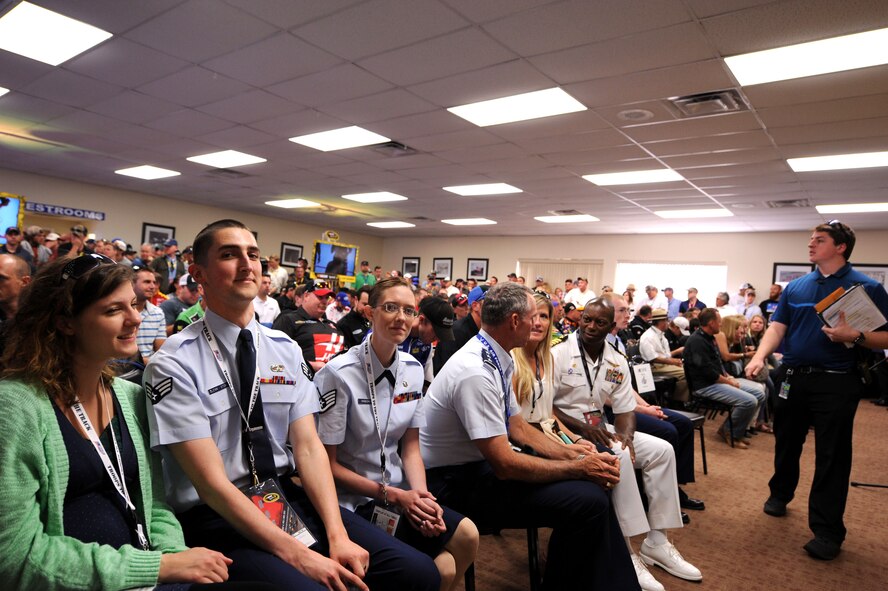 Air Education and Training Command’s 2015 12 Outstanding Airmen of the Year award recipients from Maxwell Air Force Base landed front-row seats at the crew chief meeting during the Geico 500 race at the Talladega Superspeedway, May 3, 2015, Talladega, Alabama. The meeting is mandatory for all drivers to cover safety rules and regulations before the race. (U.S. Air Force photo by Airman 1st Class Alexa Culbert/Cleared)