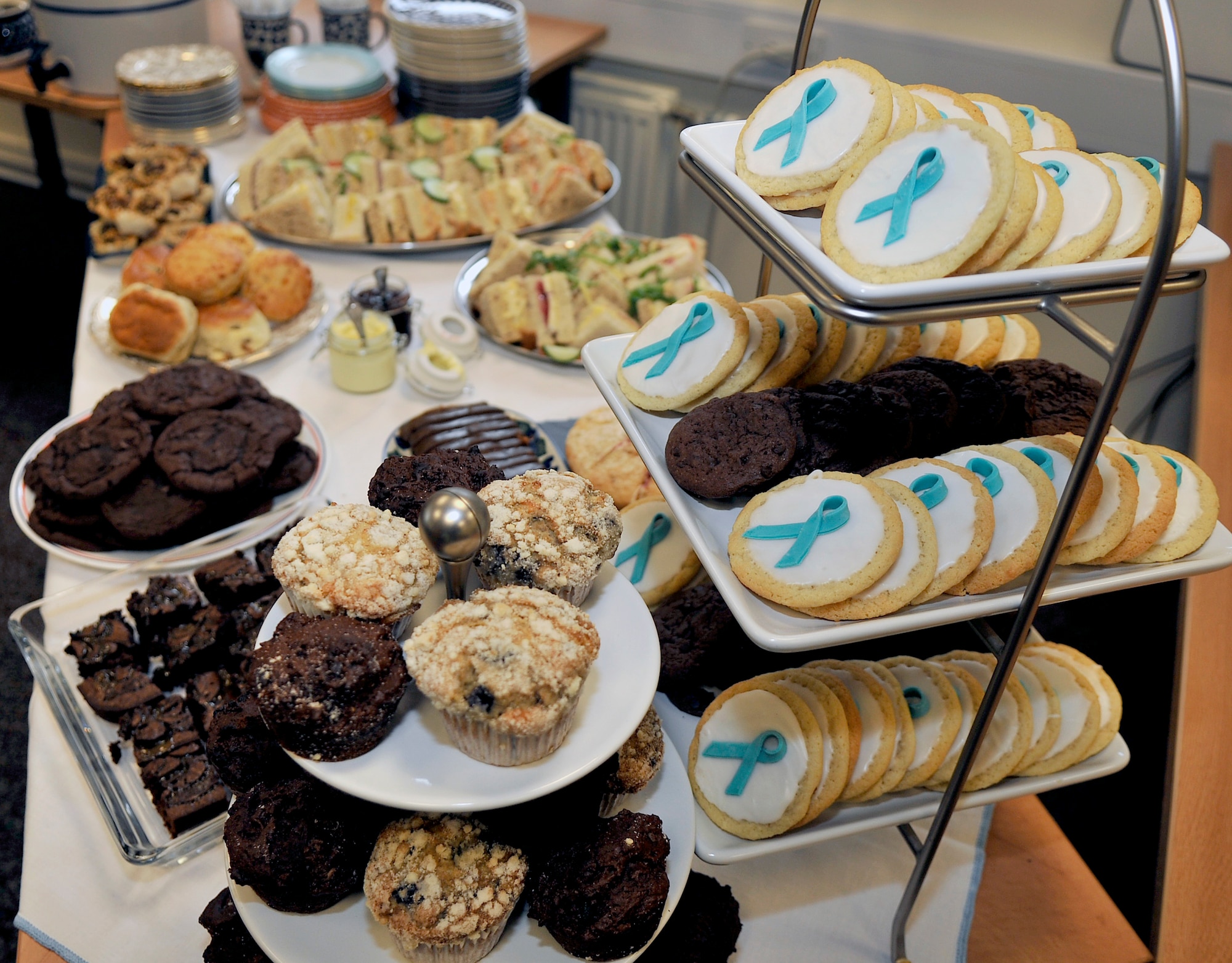 Tea, coffee and snacks were offered for the Sexual Assault Prevention and Response Tea and Talk, April 30, 2015, on RAF Mildenhall, England. The event, hosted by the SAPR office, provided a relaxed atmosphere for Team Mildenhall members to listen to two survivors tell their stories. (U.S. Air Force photo by Airman 1st Class Kyla Gifford/Released)