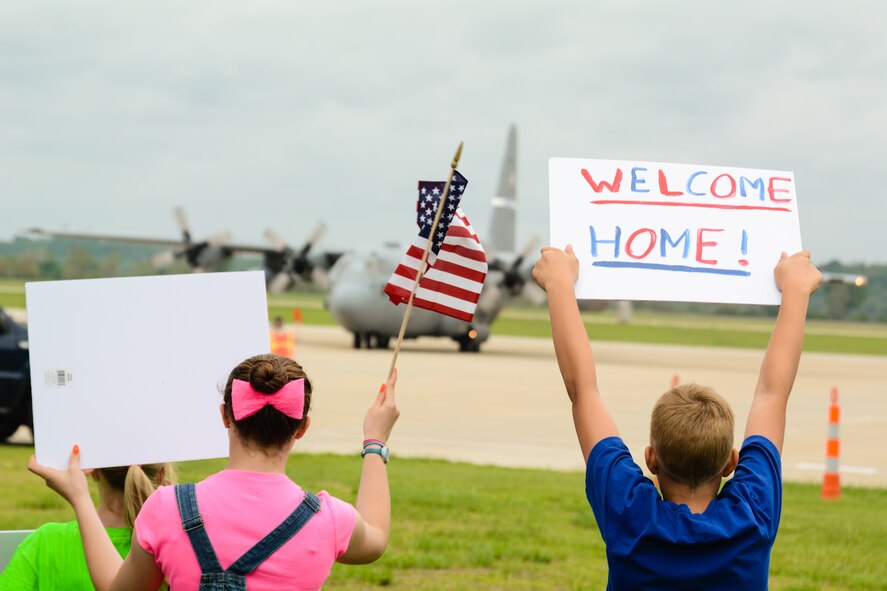 Airmen from the 139th Airlift Wing return to Rosecrans Air National Guard Base in St. Joseph, Mo., May 6, 2105. The Airmen were deployed to the Persian Gulf supporting U.S. Central Command. (U.S. Air National Guard photo by Tech. Sgt. Michael Crane)