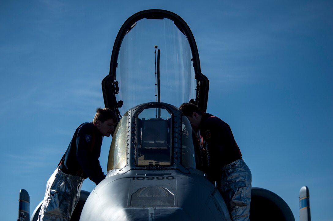 Estonian air force fire fighters are trained on A-10 Thunderbolt II attack aircraft emergency egress procedures May 4, 2015, at Ämari Air Base, Estonia.  The U.S. partners with countries like Estonia to ensure security and regional stability in Europe.  (U.S. Air Force photo by Senior Airman Rusty Frank/Released)