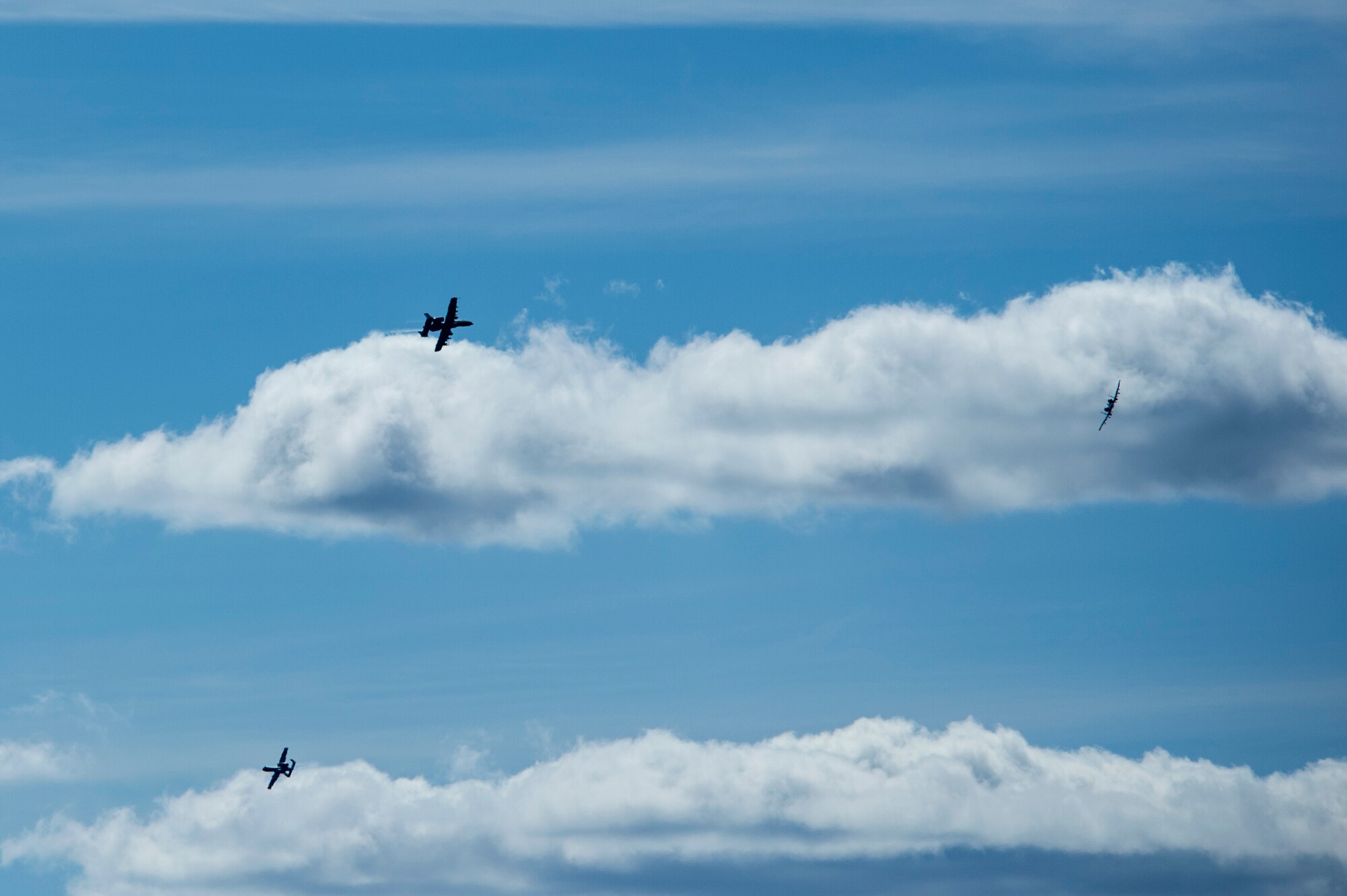 Three A-10 Thunderbolt II attack aircraft prepare to land at Ämari Air Base, Estonia, May 4, 2015. The U.S. values the shared commitment and close cooperation with NATO allies and partners on countering a range of regional and global threats. (U.S. Air Force photo by Senior Airman Rusty Frank/Released)