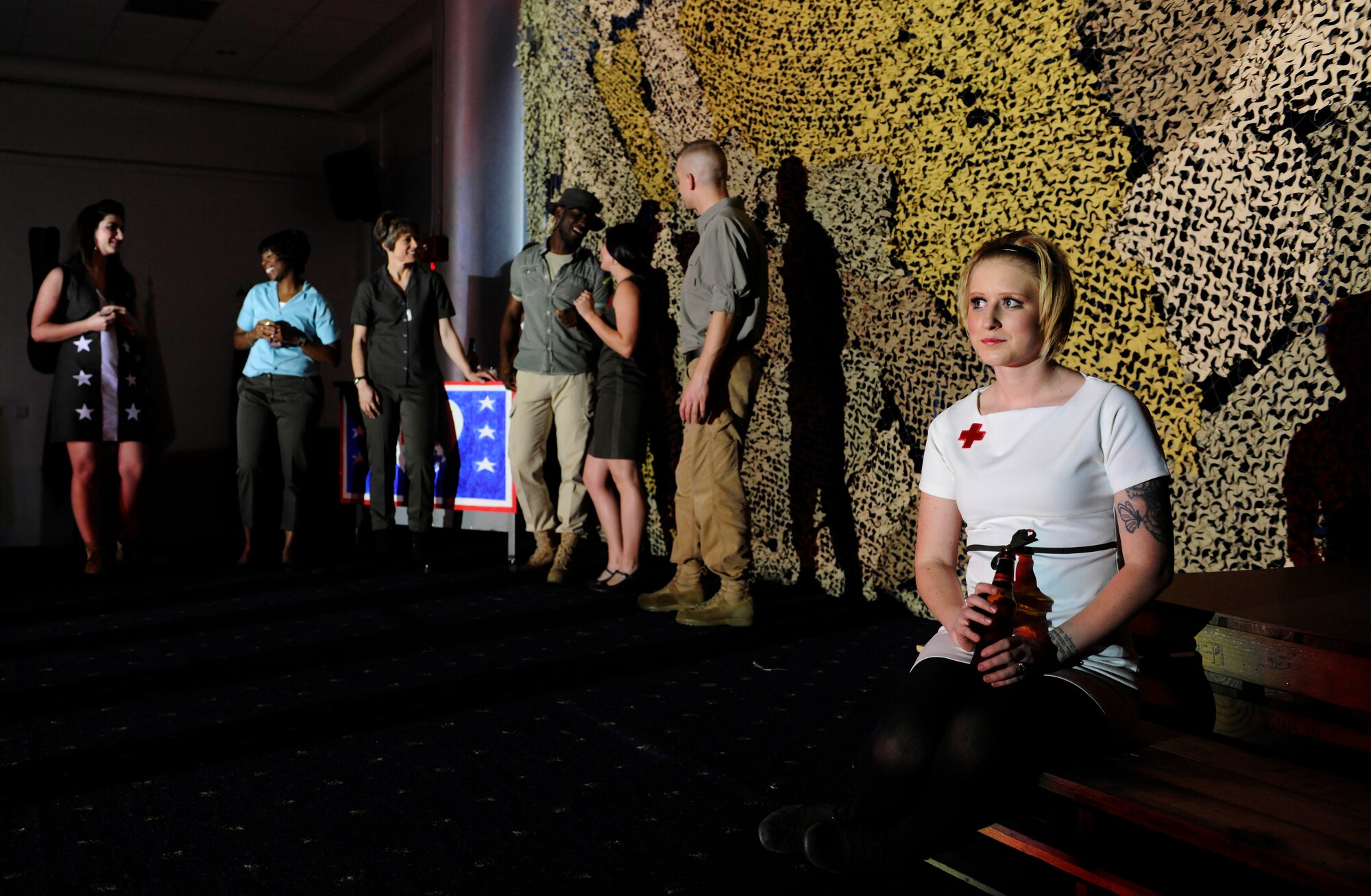 Sydney King, 39th Air Base Wing Chapel Protestant parish coordinator, sits on a stage awaiting her line cue during the Incirlik Fine Arts Society’s spring play, ‘A Piece of My Heart’ April 29, 2015, at Incirlik Air Base, Turkey. The IFAS theater group is comprised of active-duty service members, civilians and dependents. Each year, the group develops and performs numerous plays and musical from a variety of genres. (U.S Air Force photos by Senior Airman Krystal Ardrey/Released)