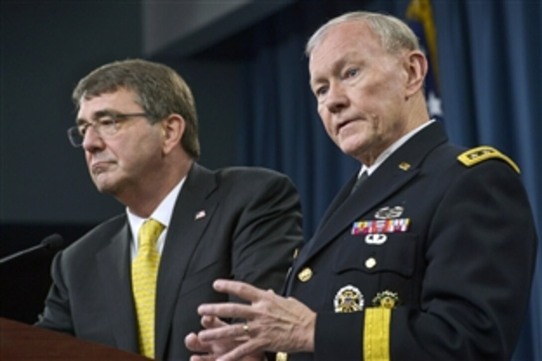 Army Gen. Martin E. Dempsey, chairman of the Joint Chiefs of Staff, answers a reporter's questions as Defense Secretary Ash Carter listens during a press conference at the Pentagon, May 7, 2015. 