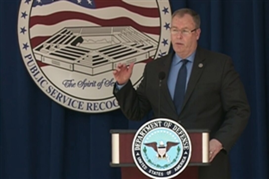 Deputy Defense Secretary Bob Work offers remarks during the Defense Department's ceremony for Public Service Recognition Week at the Pentagon, May 7, 2015. The event recognized 31 civilian public servants who display the core qualities of honor, integrity and excellence in their daily service.
