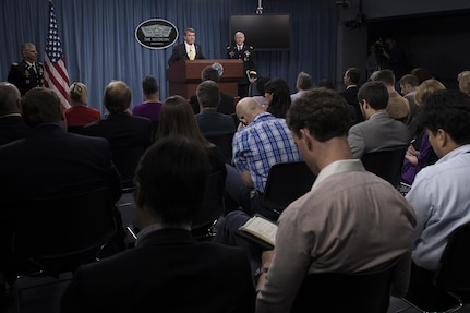 Secretary of Defense Ash Carter and 18th Chairman of the Joint Chiefs of Staff Gen. Martin E. Dempsey brief the press in the Press Briefing Room at the Pentagon, May 7, 2015.