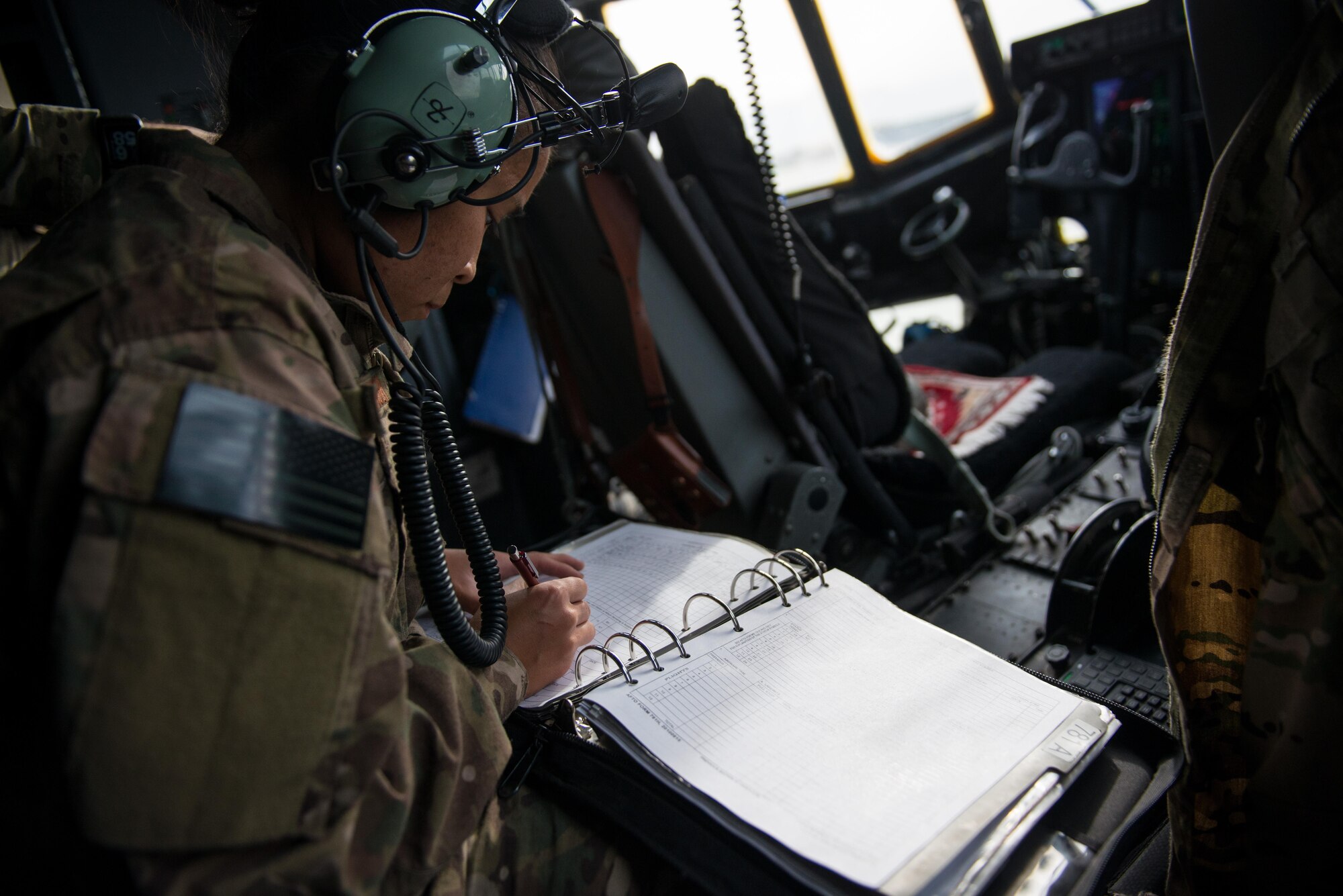 U.S. Air Force Senior Airman Mina Phouangphidok, assigned to the 455th Expeditionary Aircraft Maintenance Squadron, performs post flight checks on a C-130J Super Hercules aircraft on the flight line at Bagram Airfield, Afghanistan, May 5, 2015.  The 455th EAMXS ensure Super Hercules on Bagram are prepared for flight and return them to a mission-ready state once they land. (U.S. Air Force photo by Tech. Sgt. Joseph Swafford/Released) 
