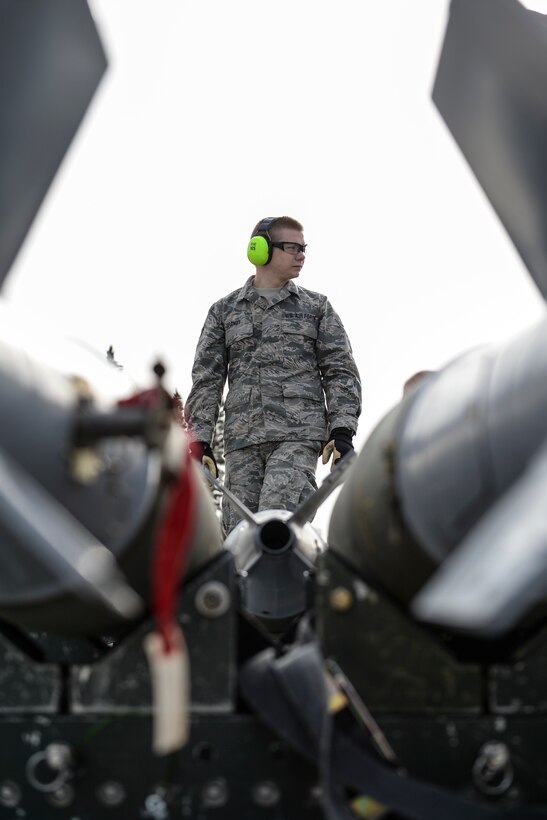 Senior Airman Keith Brandt, a munitions systems journeyman assigned to the 180th Maintenance Squadron, loads MK-82 general purpose bombs onto a trailer May 1, 2015, during Red Flag-Alaska 15-2 at Eielson Air Force Base, Alaska. The exercise enables units from around the globe to conduct live-fire training, utilizing 67,000 square miles of airspace over the Joint Pacific Alaska Range Complex. (U.S. Air Force photo/Senior Airman Peter Reft)
