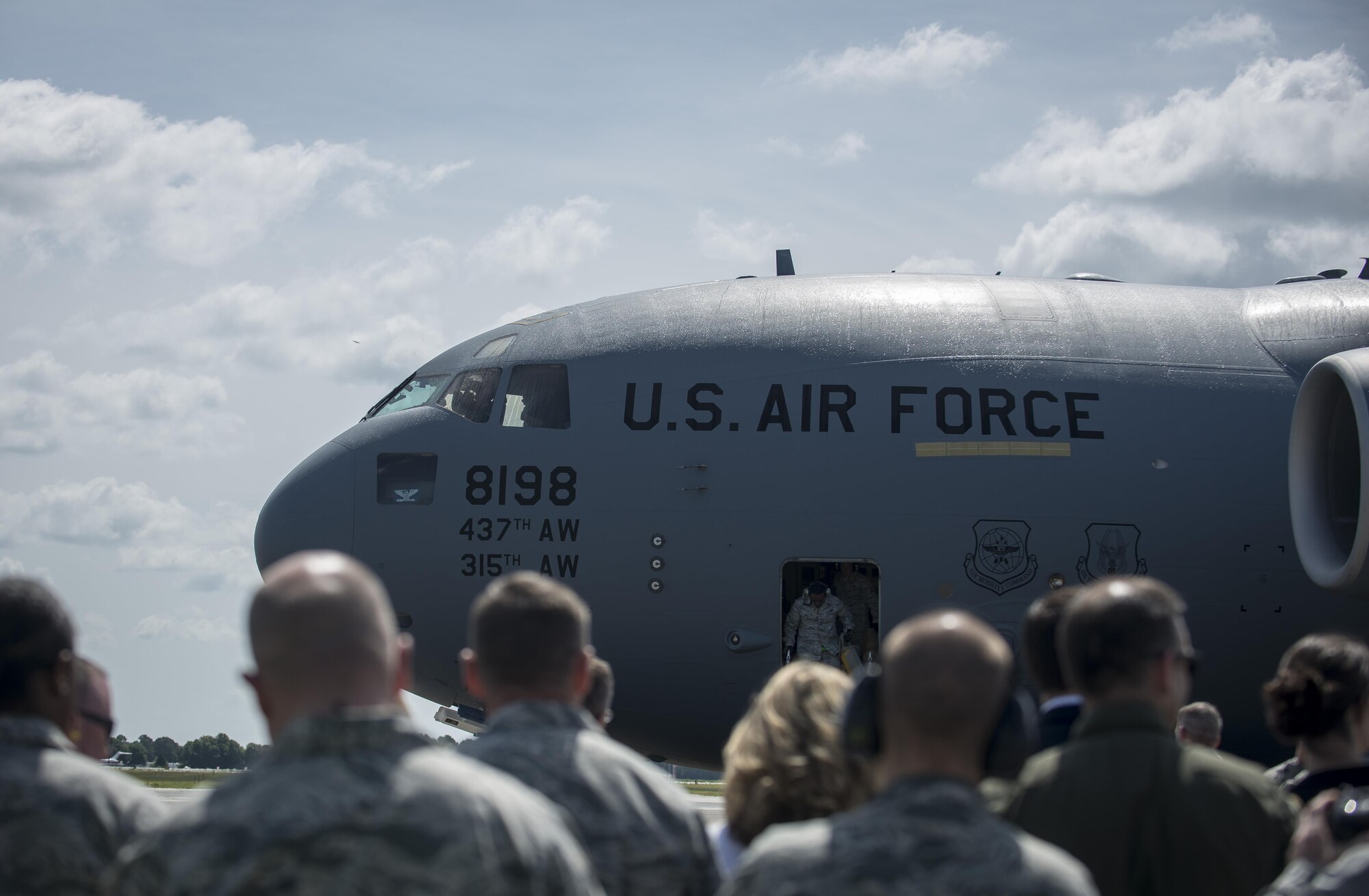 A C-17 Globemaster III lands May 5, 2015, at Joint Base Charleston, S.C, during an event celebrating the C-17 surpassing the 3 millionth flying hour. Aircrew members from Charleston flew the plane from Robins Air Force Base, Ga. The first C-17 flight was Sept. 15, 1991, and the Air Force currently has 222 C-17s in the fleet. (U.S. Air Force photo/Senior Airman Jared Trimarchi) 
