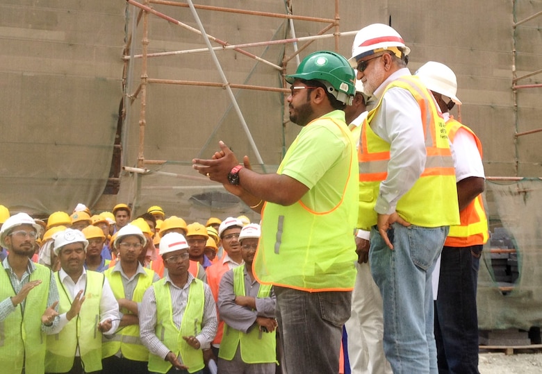 Workers with the Bahrain Resident Office conducted a Construction Safety Stand-Down May 4th at the P935/940 (Transient Bachelor Quarters) construction site where projects reached one million man-hours free of safety violations or accidents.   Area Engineer Shahzada Shahrukh spoke to workers about the importance of safety in the workplace, particularly about Fall Prevention. The P935/940 projects reached one million man-hour free of safety violations or accidents.   