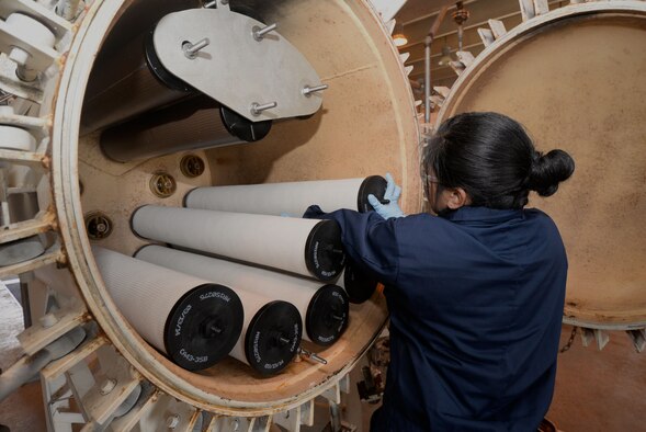 Staff Sgt. Staci Ducusin, a 36th Civil Engineer Squadron water and fuels systems craftsman, replaces fuel filter separator elements to provide aircraft with clean fuel April 28, 2015, at a fuel hydrant pump house at Andersen Air Force Base, Guam. The section installs, inspects and maintains 600 facilities that include plumbing, liquid fuel storage and distribution and dispensing systems on base. (U.S. Air Force photo/Airman 1st Class Joshua Smoot)