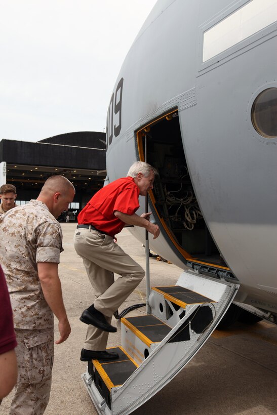 Secretary of the Navy Ray Mabus boards a KC-130J Super Hercules during a tour of the flightline at Marine Corps Air Station Cherry Point, North Carolina, May 6, 2015. The Super Hercules belongs to Marine Aerial Refueler Transport Squadron 252 at Cherry Point. 