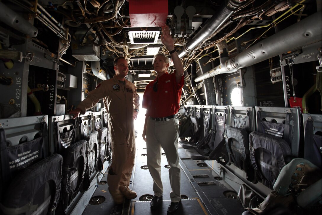 Lt. Col. Samuel C. Schoolfield gives Secretary of the Navy Ray Mabus a tour of the inside of an MV-22B Osprey during a visit to Marine Corps Air Station Cherry Point, North Carolina, May 6, 2015. Schoolfield is the commanding officer of Marine Medium Tiltrotoe Squadron 263 (Reinforced).