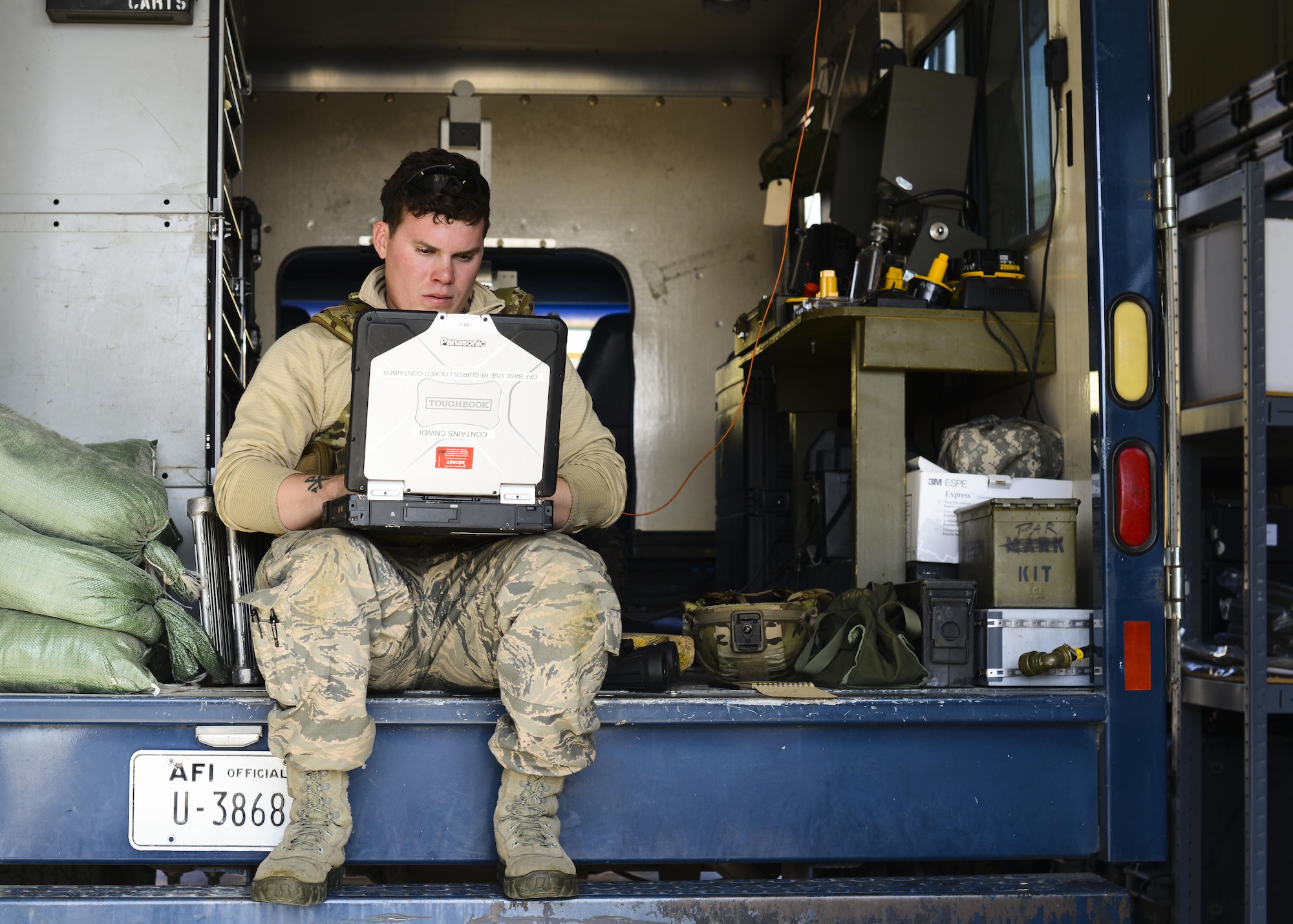 Senior Airman Josiah Hamernick, a 31st Civil Engineer Squadron explosive ordnance disposal apprentice, identifies ordnance using the Automated Explosive Ordnance Disposal Publication System during training April 22, 2015, at Aviano Air Base, Italy. The AEODPS contains thousands of weapons, explosives, aircraft parts and other items technicians may encounter on a mission. (U.S. Air Force photo/Senior Airman Austin Harvill)